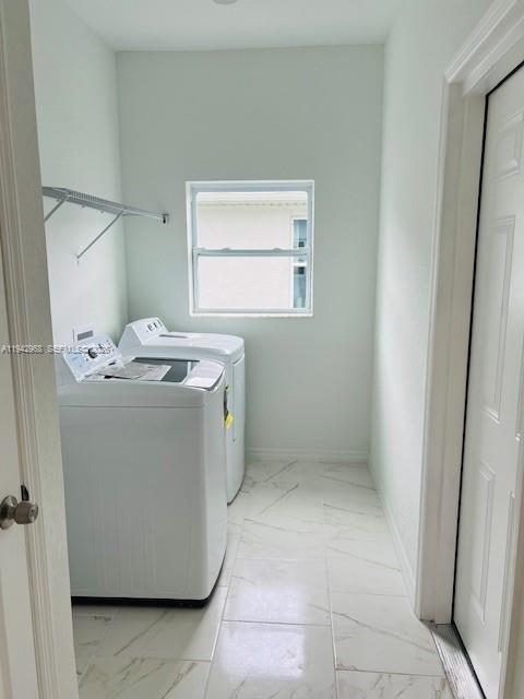 475 Sunset Road North Rotonda West, FL 33947 - Photo 13 of 17 a utility room with dryer and washer