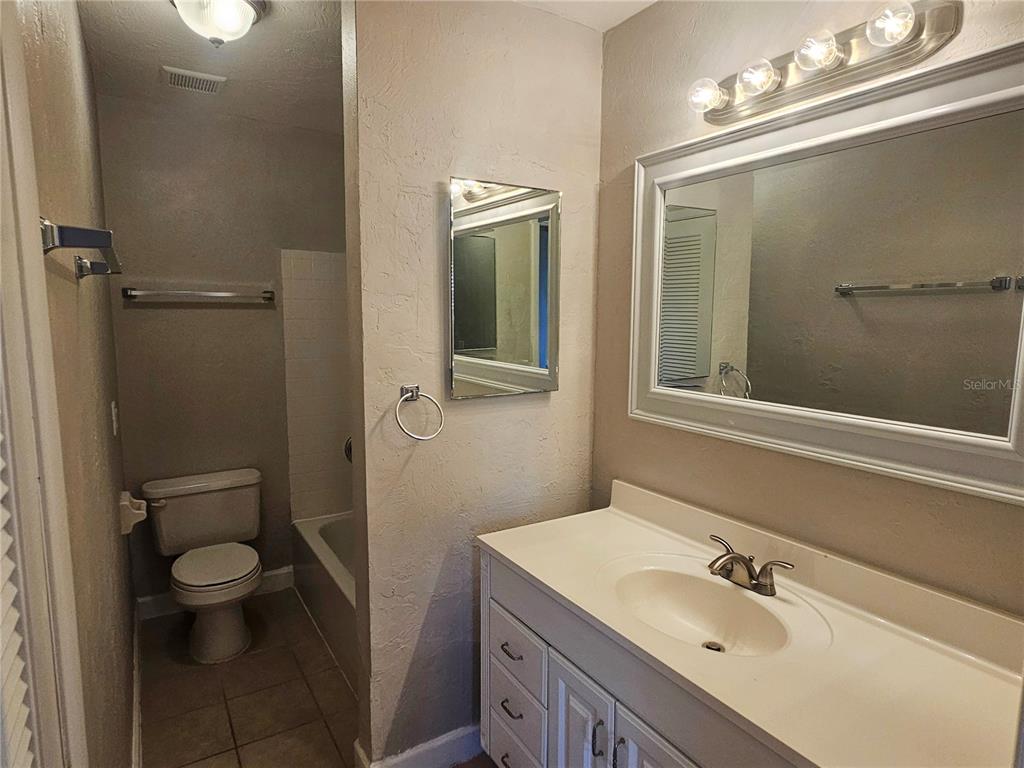7000 Brentford Road Sarasota, FL 34241 - Photo 20 of 29 a bathroom with a sink a toilet and shower