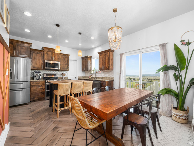 256 West Horizon Loop Payson, UT 84651 - Photo 7 of 33 Dining room with a chandelier and parquet flooring