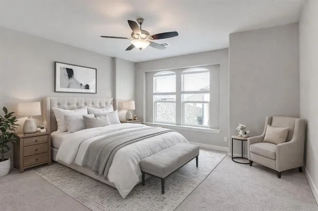 a bathroom with a sink double vanity granite tub shower and a mirror