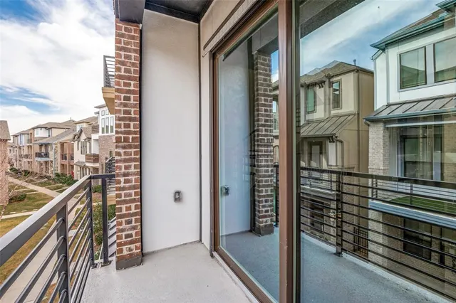 a picture of a bench in front of a wall