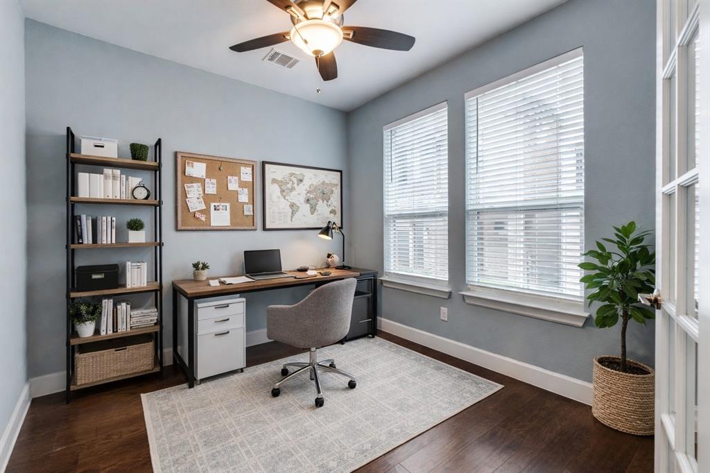 8233 Laflin Lane Dallas, TX 75231 - Photo 4 of 37 a workspace with a window and furniture