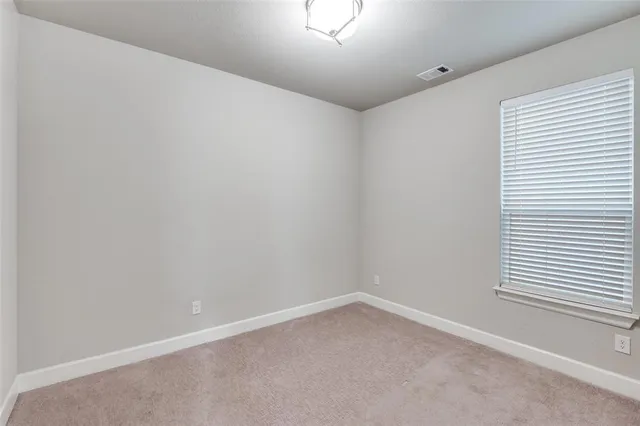 a bathroom with a toilet a sink and bathtub