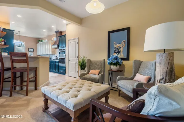 a living room with furniture and a table