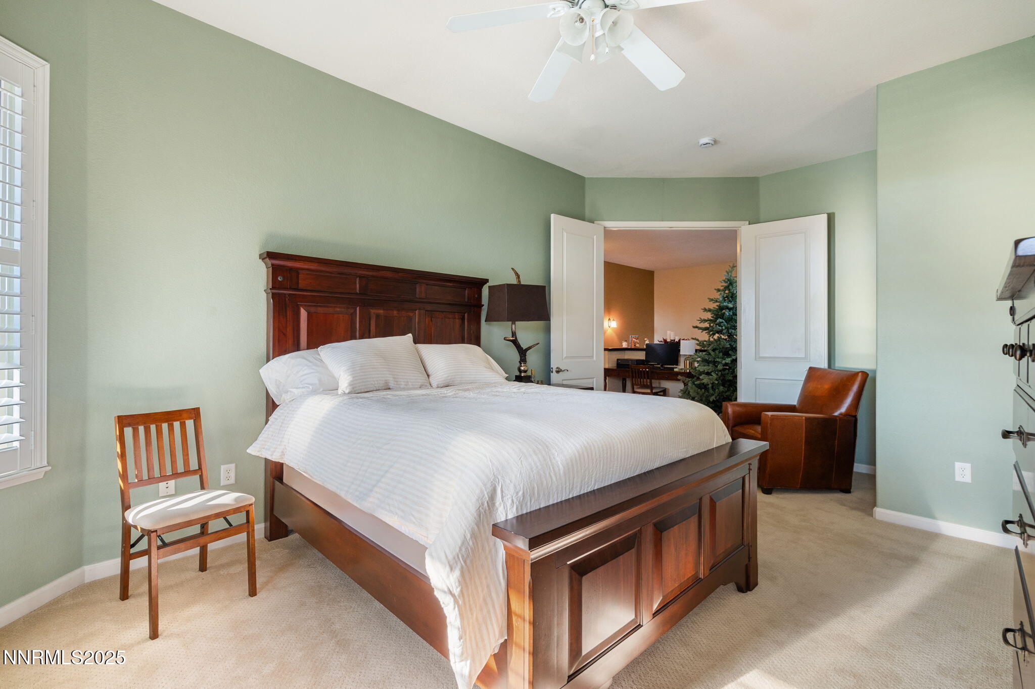 9900 Wilbur May Parkway, Unit 906 Reno, NV 89521 - Photo 23 of 45 a bed room with a bed and a chair