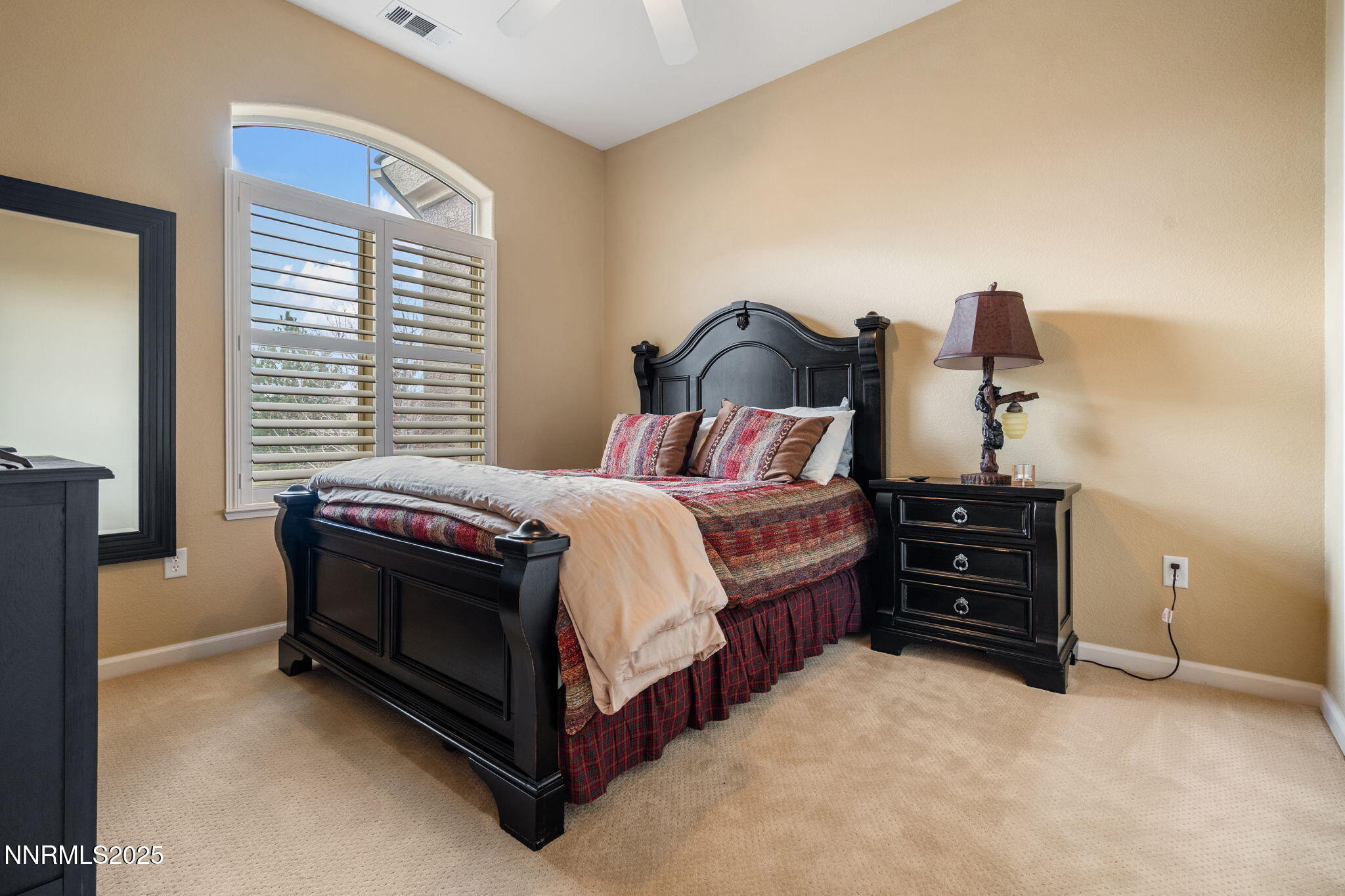 9900 Wilbur May Parkway, Unit 906 Reno, NV 89521 - Photo 27 of 45 a bedroom with a bed and a closet