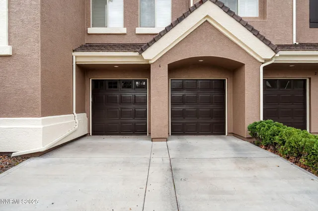 a view of house with garage