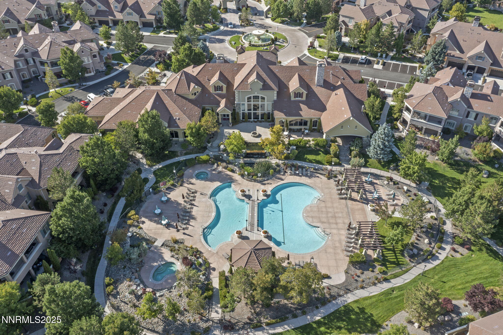 9900 Wilbur May Parkway, Unit 906 Reno, NV 89521 - Photo 33 of 45 an aerial view of multiple houses with yard