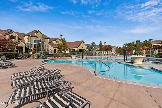 a view of a street with houses on both side