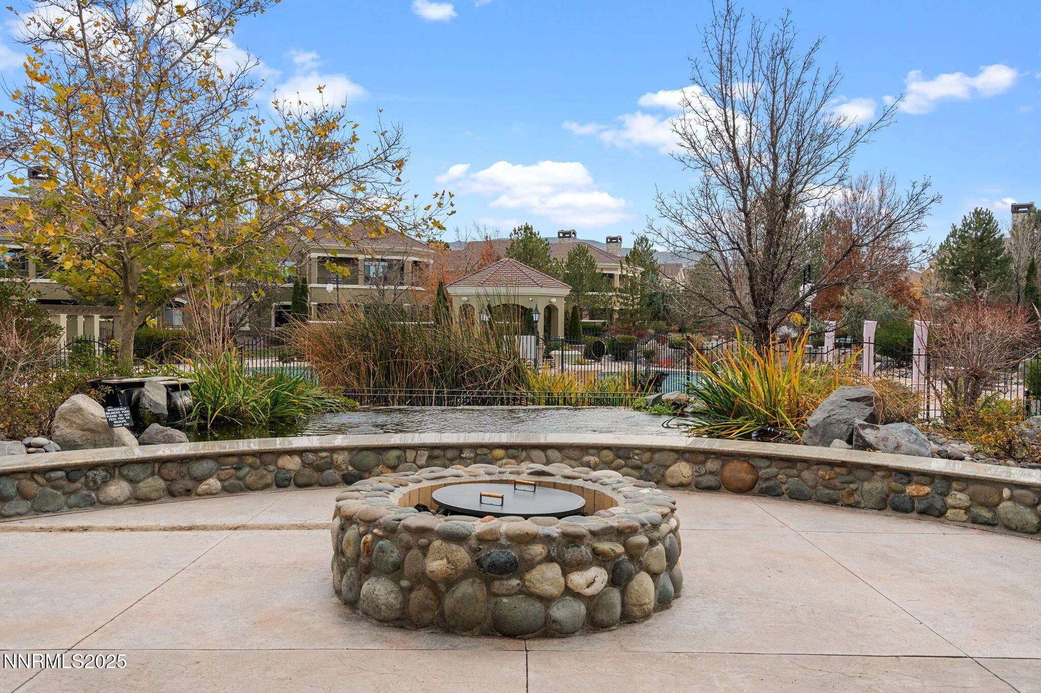 9900 Wilbur May Parkway, Unit 906 Reno, NV 89521 - Photo 37 of 45 a view of a house with a large tree