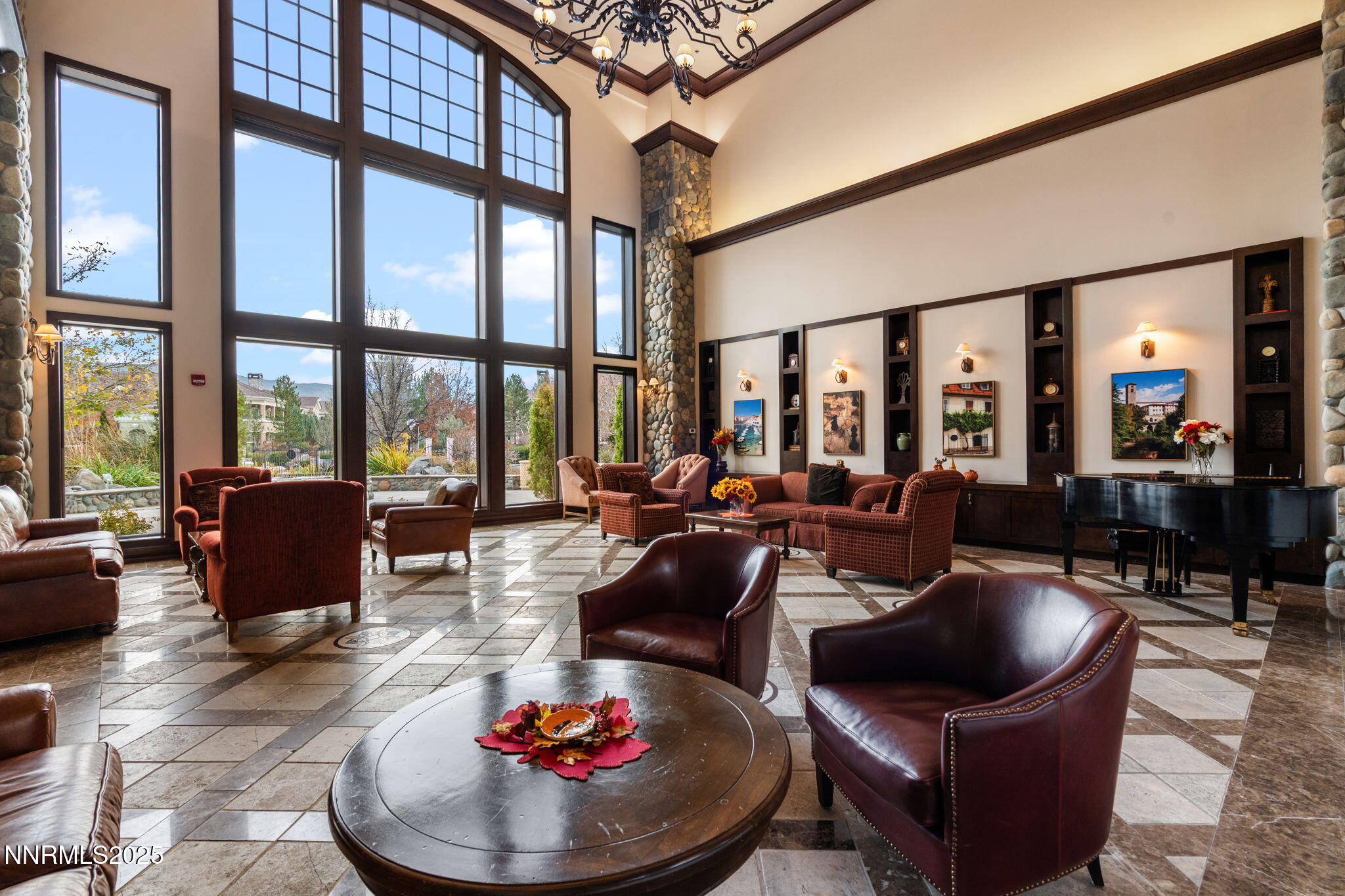 9900 Wilbur May Parkway, Unit 906 Reno, NV 89521 - Photo 38 of 45 a living room with furniture and a floor to ceiling window