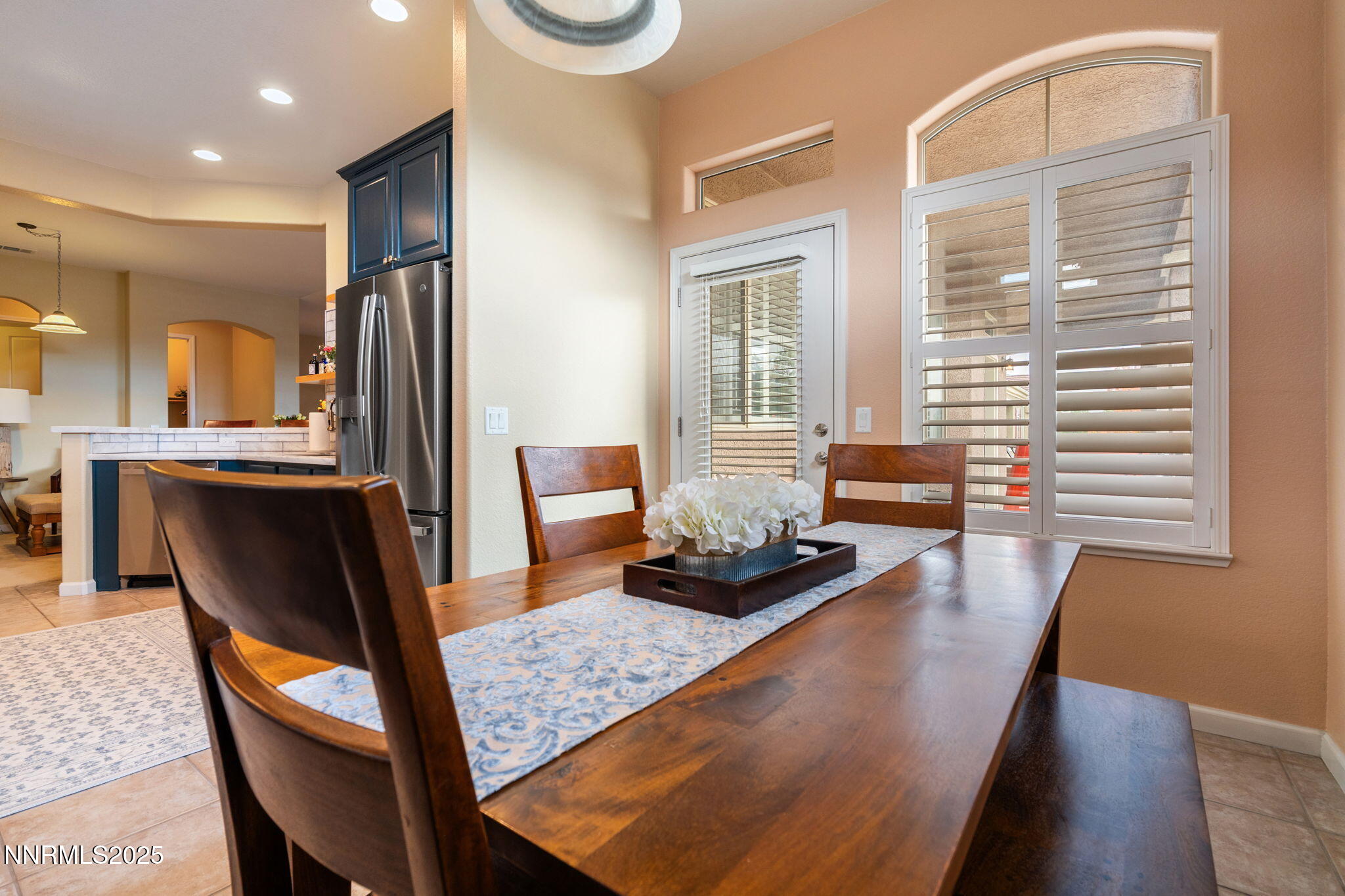 9900 Wilbur May Parkway, Unit 906 Reno, NV 89521 - Photo 8 of 45 a dining room with furniture and wooden floor