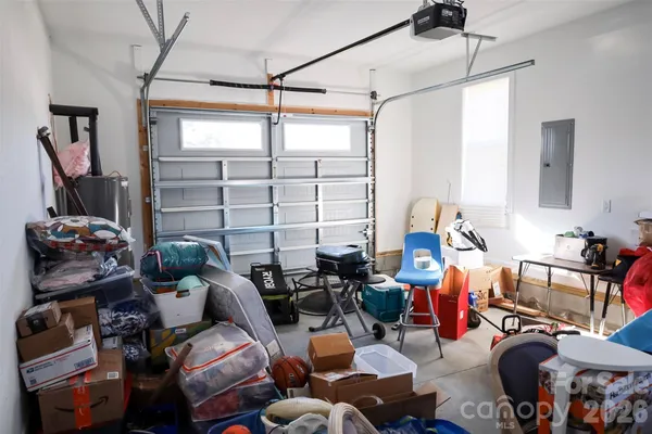 a front view of brick house with a yard