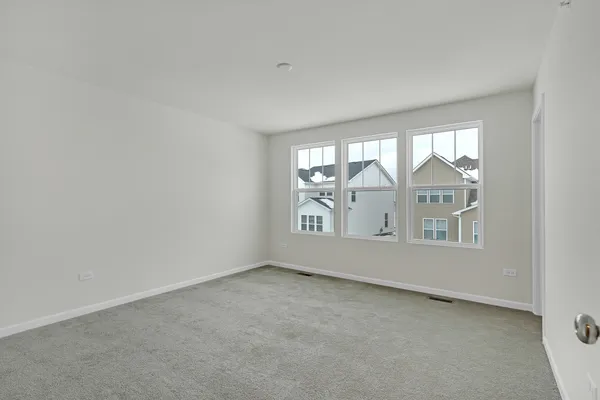 a view of an empty room and closet