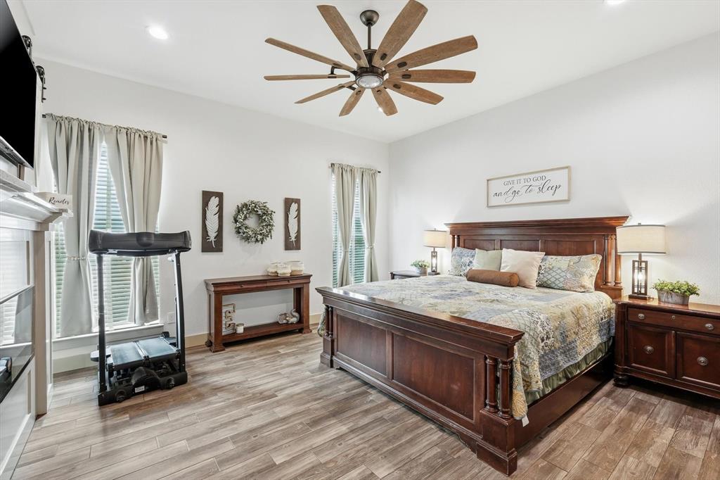 6020 Honeysuckle Road Midlothian, TX 76065 - Photo 18 of 39 Spacious interior featuring wood-finish flooring, recessed lighting, and a multi-blade ceiling fan