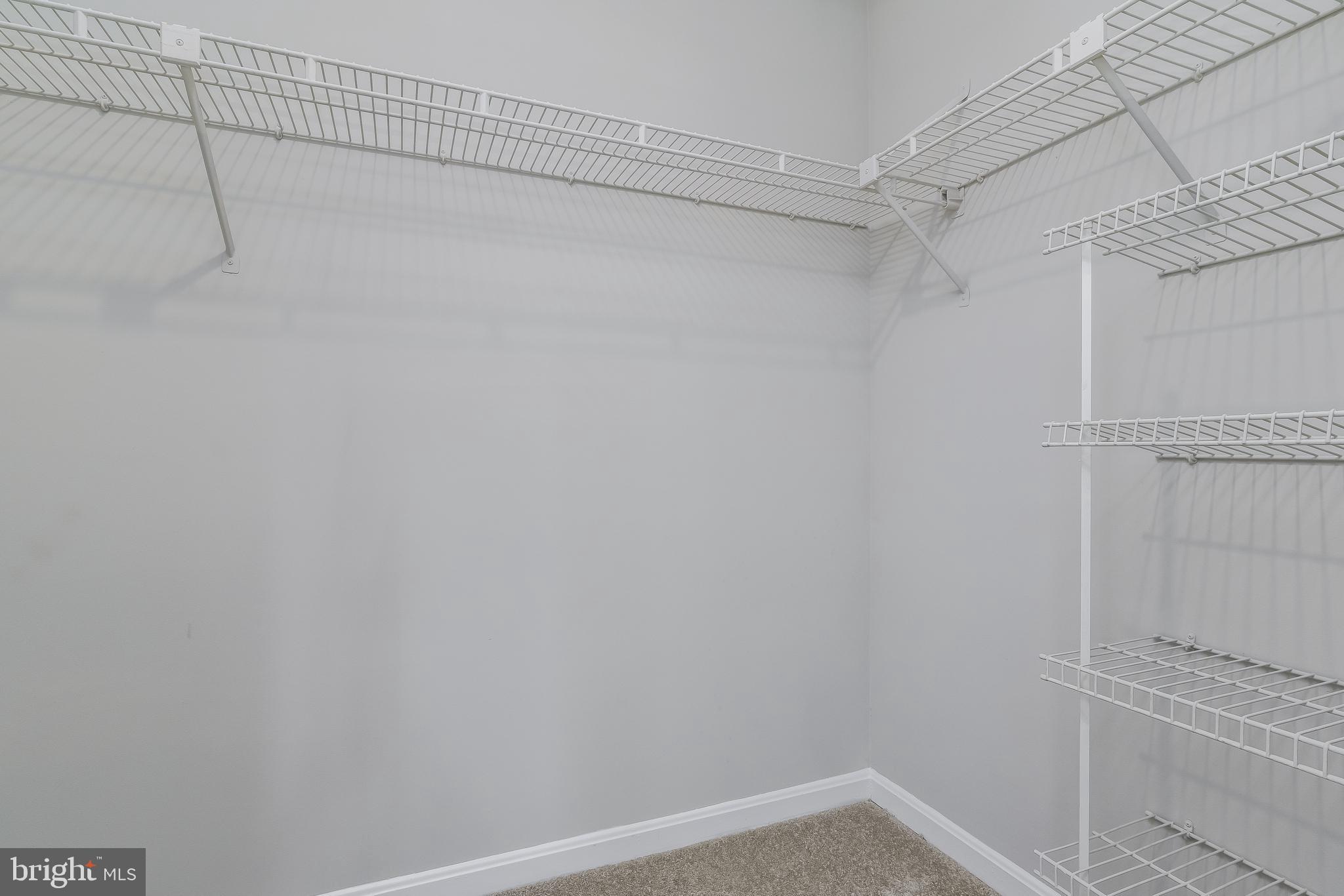 18322 Streamside Drive, Unit 104 Gaithersburg, MD 20879 - Photo 28 of 38 Master Walk-in Closet