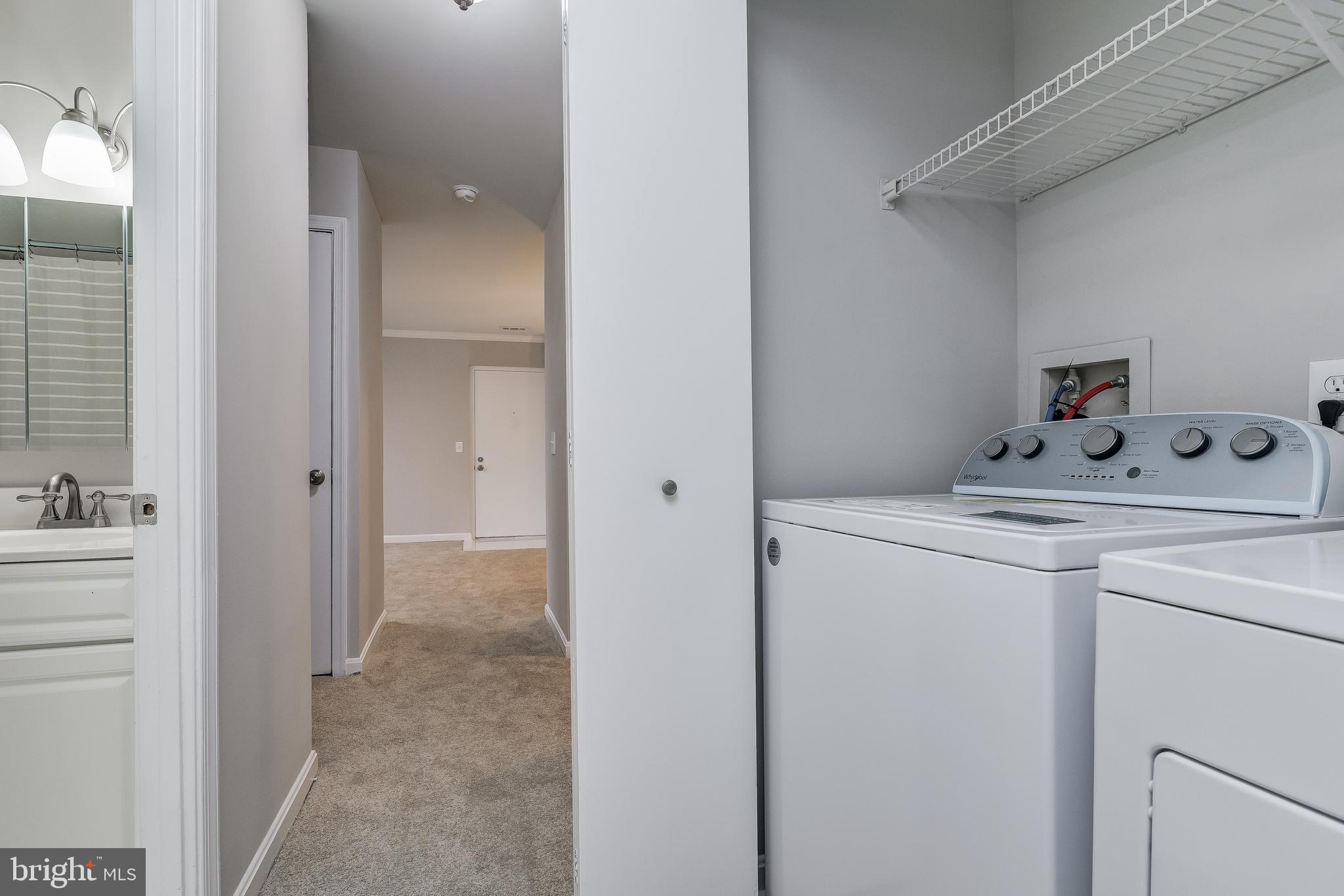 18322 Streamside Drive, Unit 104 Gaithersburg, MD 20879 - Photo 30 of 38 Washer/Dryer Closet