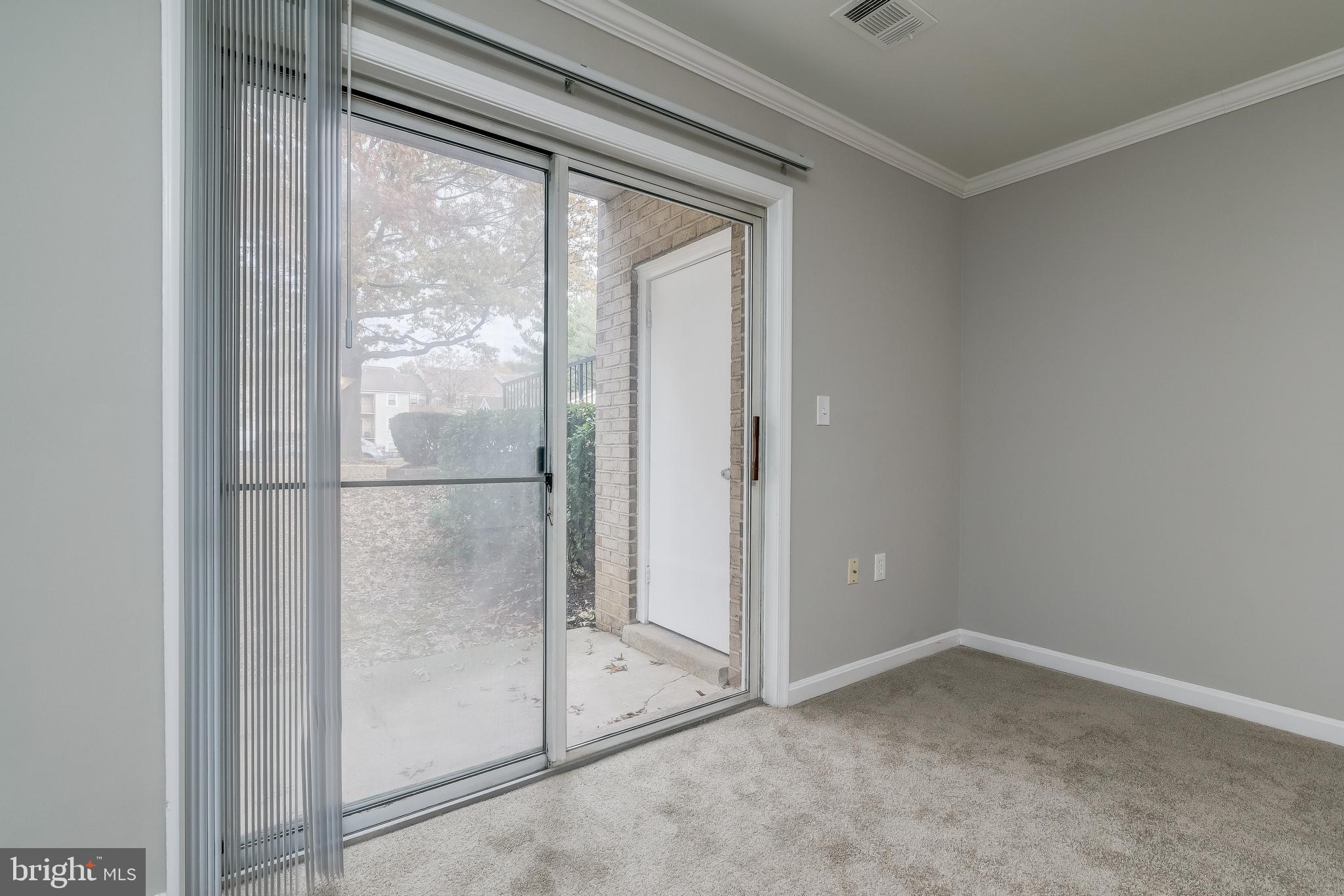 18322 Streamside Drive, Unit 104 Gaithersburg, MD 20879 - Photo 7 of 38 Exit to Patio