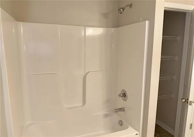 a bathroom with a bathtub
