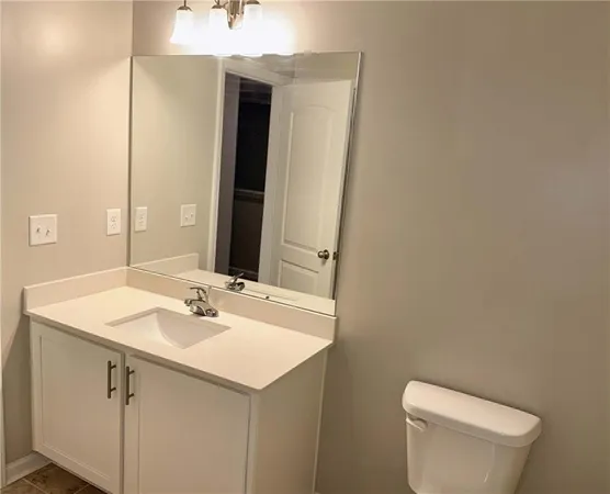 a bathroom with a sink and a toilet