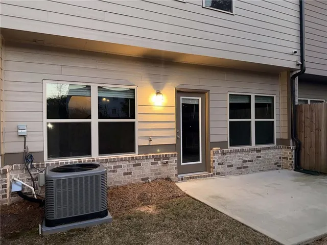 a front view of a house with windows