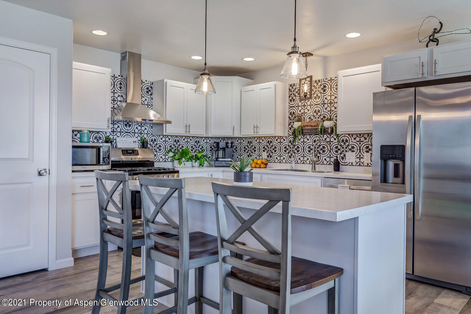 932 East 17th Street Rifle, CO 81650 - Photo 12 of 21 a kitchen with a table and chairs in it