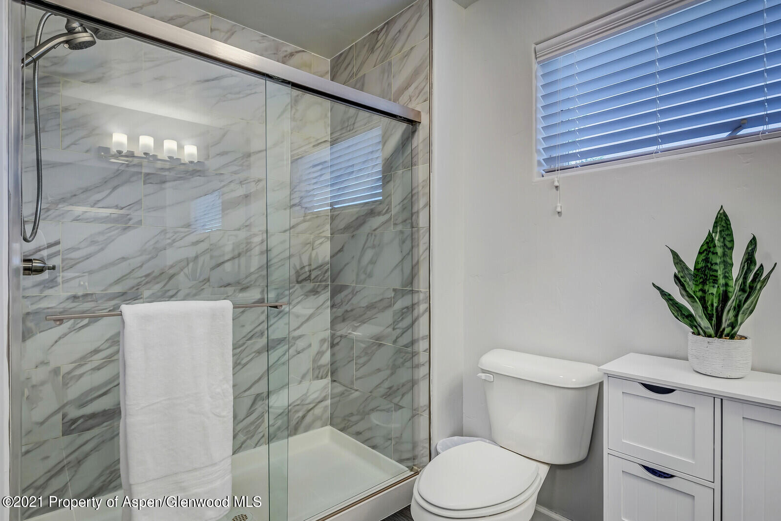 932 East 17th Street Rifle, CO 81650 - Photo 16 of 21 a bathroom with a toilet and a shower