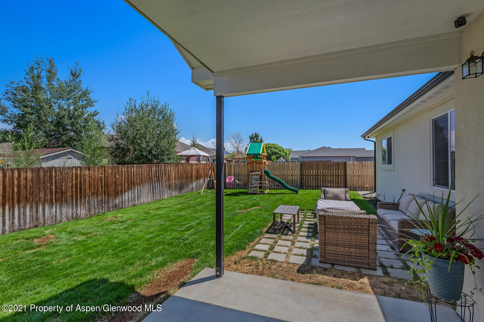 932 East 17th Street Rifle, CO 81650 - Photo 4 of 21 a garden view with a seating space