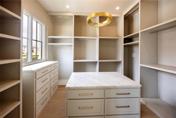 a kitchen with a cabinets and a stove