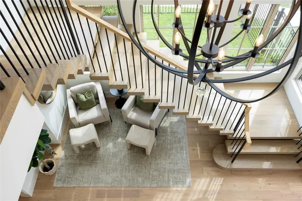 an outdoor living room with furniture and a rug