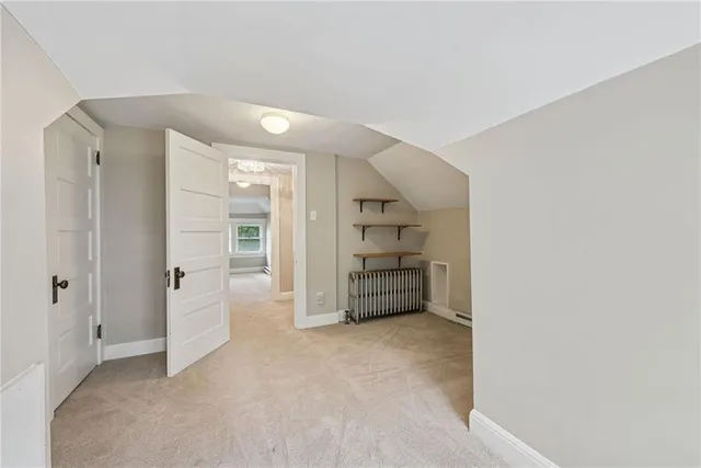 a bathroom with a sink a bathtub and window