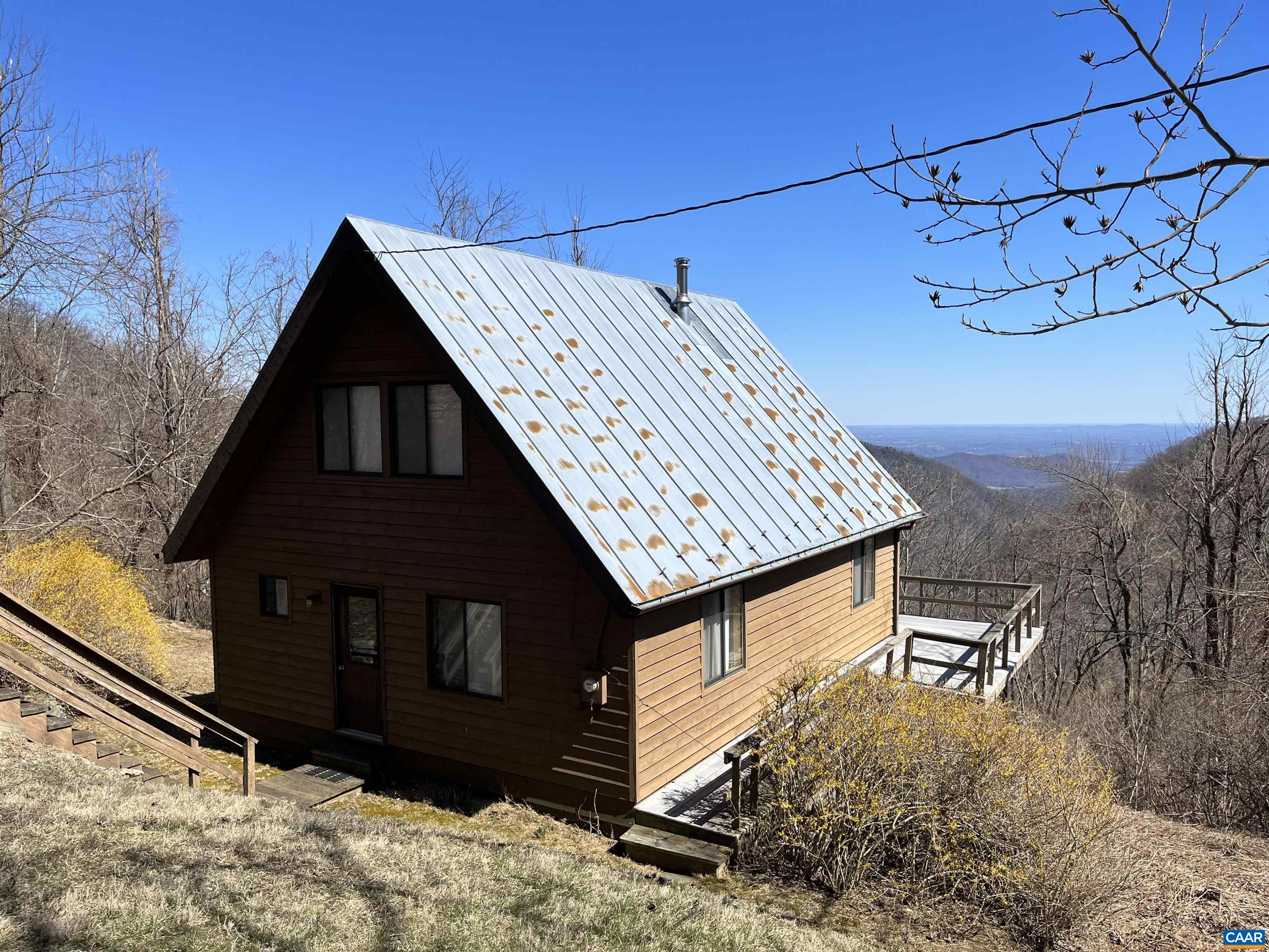 3728 Flattop Mountain Road Free Union, VA 22940 - Photo 2 of 17 a view of a house with a roof