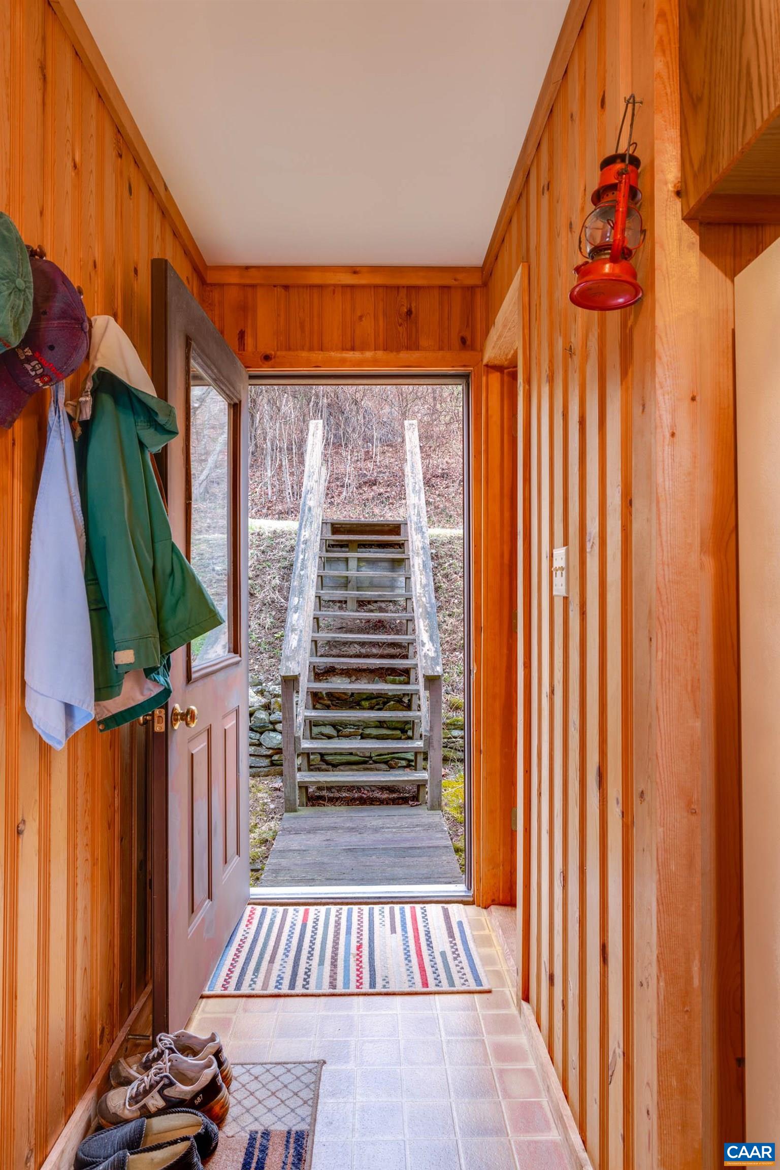 3728 Flattop Mountain Road Free Union, VA 22940 - Photo 4 of 17 a backyard of a house with wooden fence
