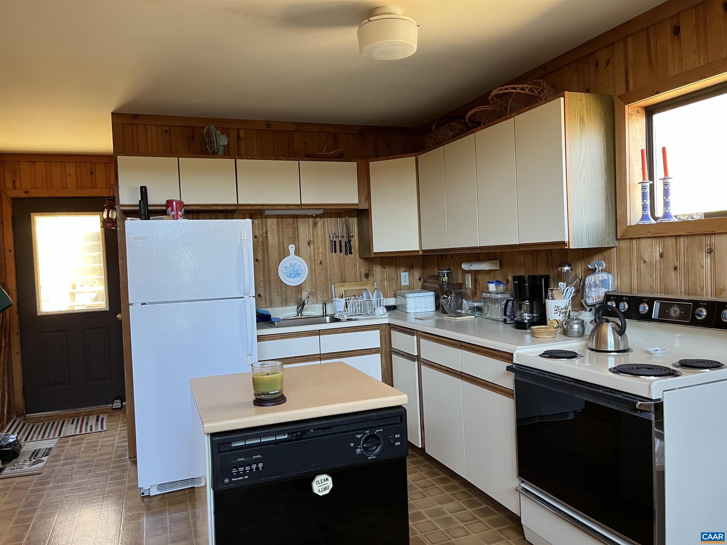 3728 Flattop Mountain Road Free Union, VA 22940 - Photo 6 of 17 a kitchen with a sink cabinets and wooden floor