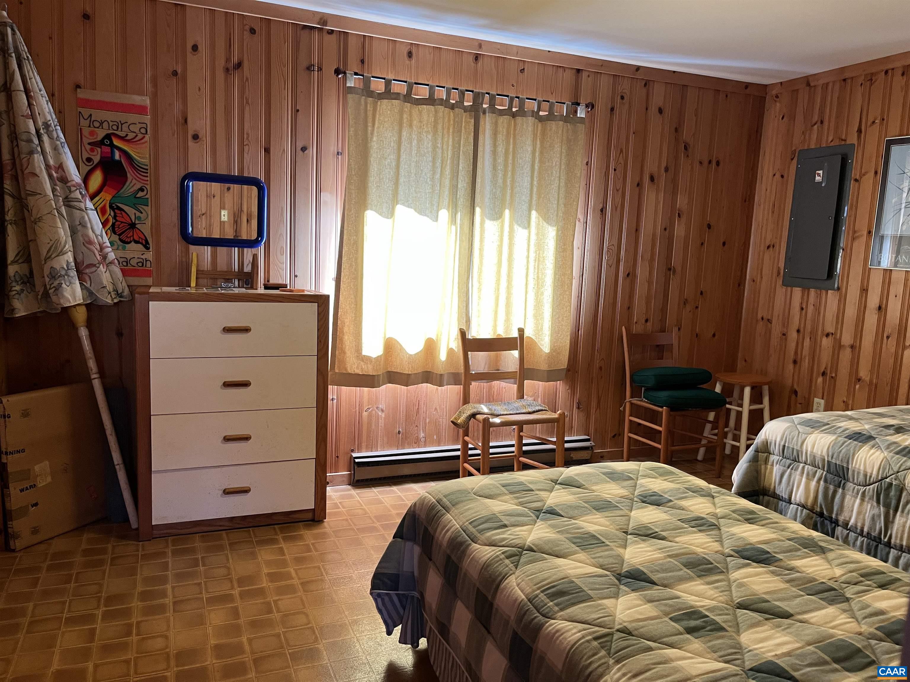 3728 Flattop Mountain Road Free Union, VA 22940 - Photo 8 of 17 a bedroom with a bed and a window