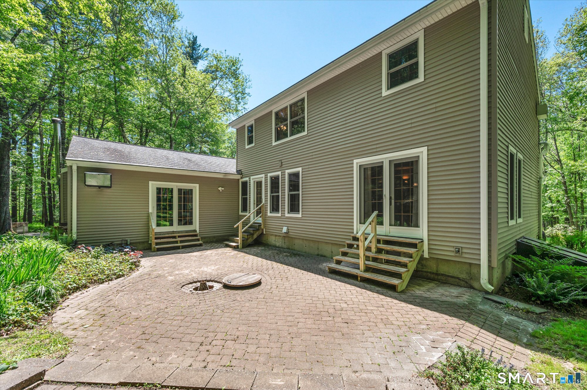 59 Indian Hill Road Canton, CT 06019 - Photo 32 of 39 a front view of a house with a yard