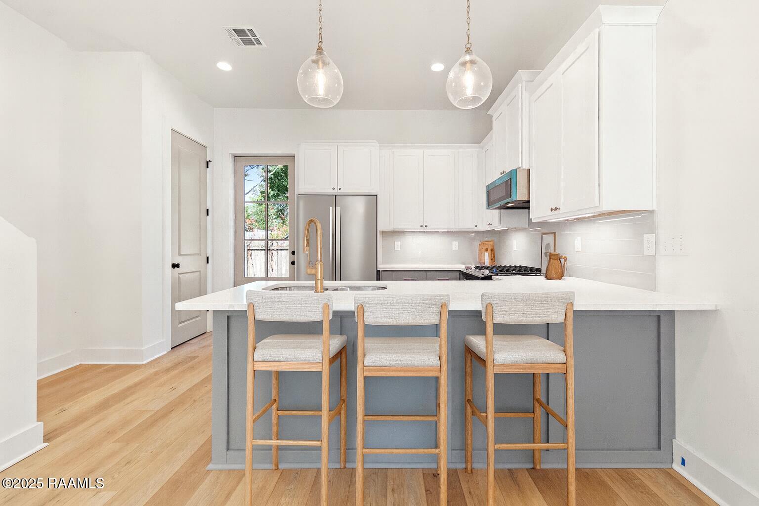 207 Steiner Road Lafayette, LA 70508 - Photo 3 of 13 kitchen staged