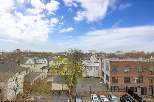 a view of city with tall buildings