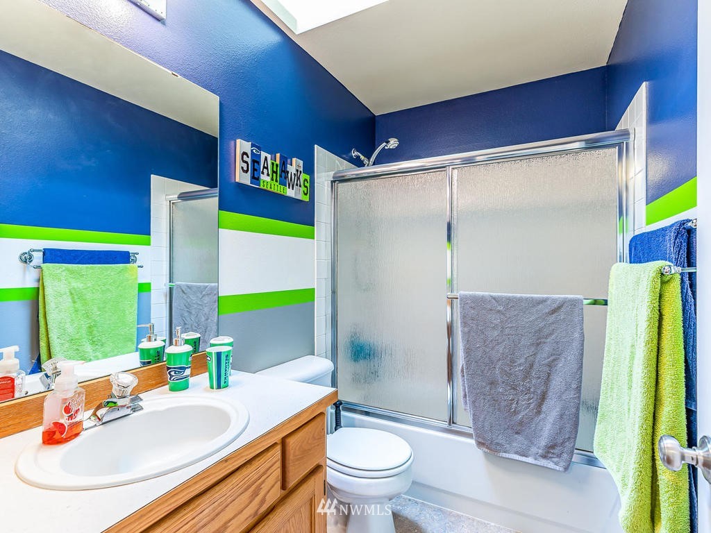 3220 228th Street Southeast Bothell, WA 98021 - Photo 22 of 35 a bathroom with a sink toilet and shower