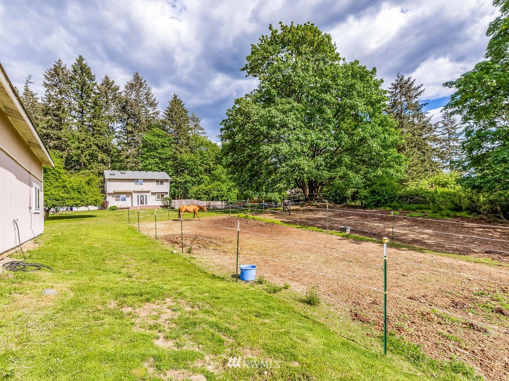 3220 228th Street Southeast Bothell, WA 98021 - Photo 30 of 35 a view of a swimming pool with an outdoor space