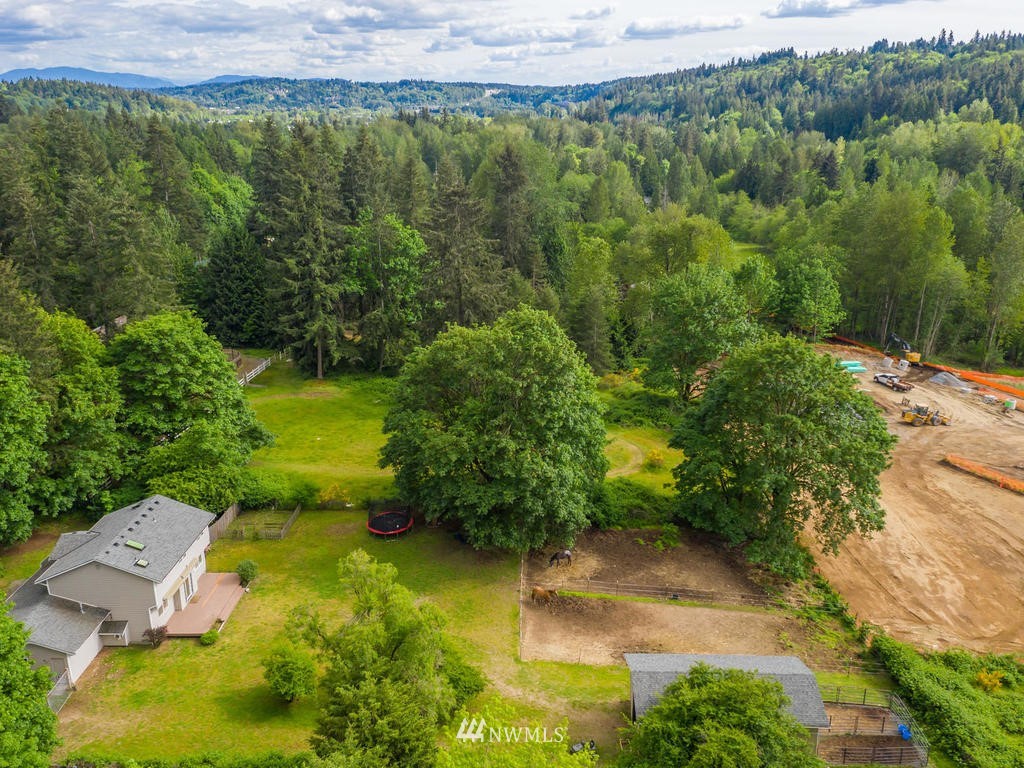 3220 228th Street Southeast Bothell, WA 98021 - Photo 31 of 35 an aerial view of a house with a yard
