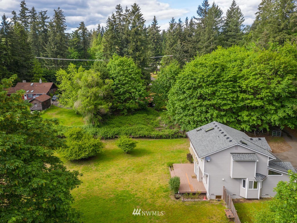3220 228th Street Southeast Bothell, WA 98021 - Photo 32 of 35 an aerial view of a house with a yard