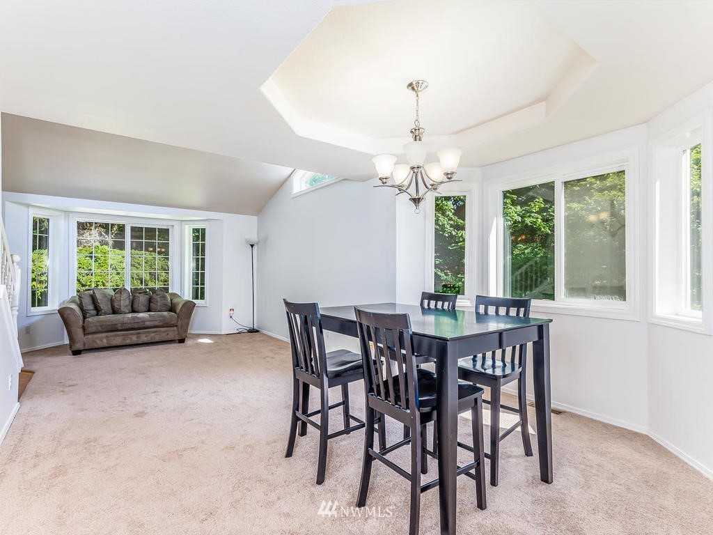 3220 228th Street Southeast Bothell, WA 98021 - Photo 6 of 35 a view of a dining room with furniture window and outside view