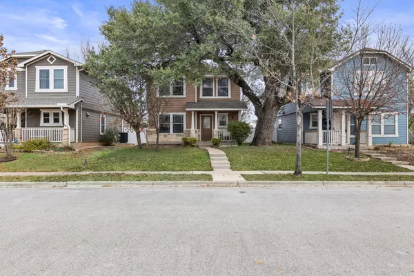 front view of a house with a yard