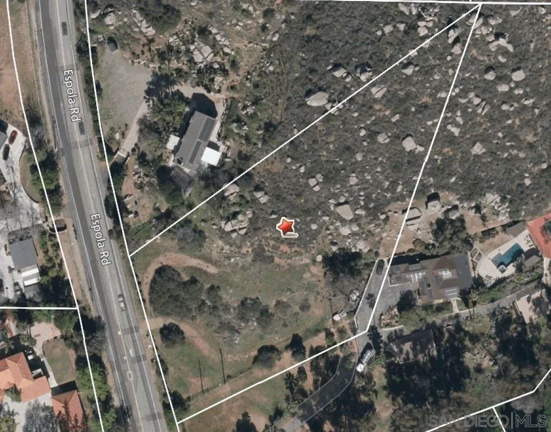 a view of balcony with wooden floor