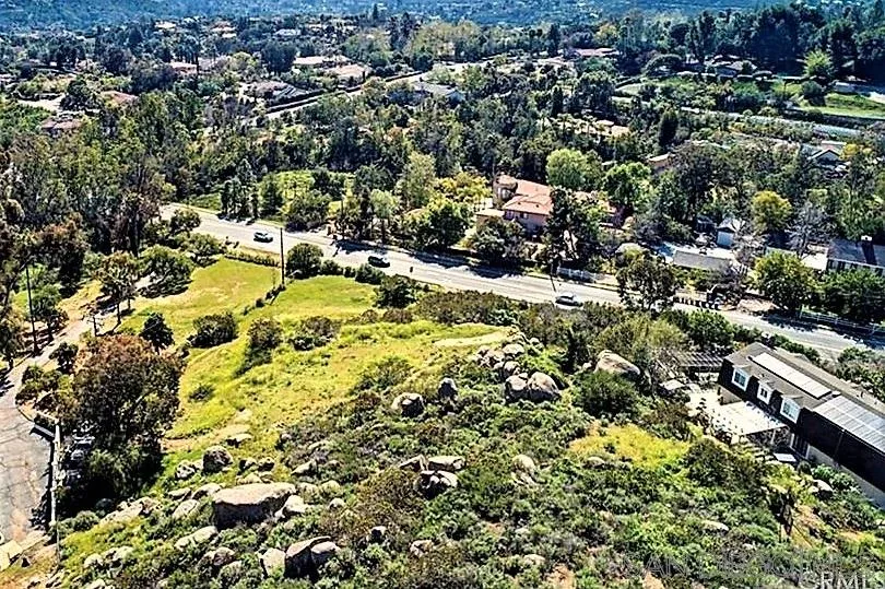 15277 Espola Road, Unit 3 Poway, CA 92064 - Photo 6 of 9 an aerial view of residential houses with outdoor space and trees