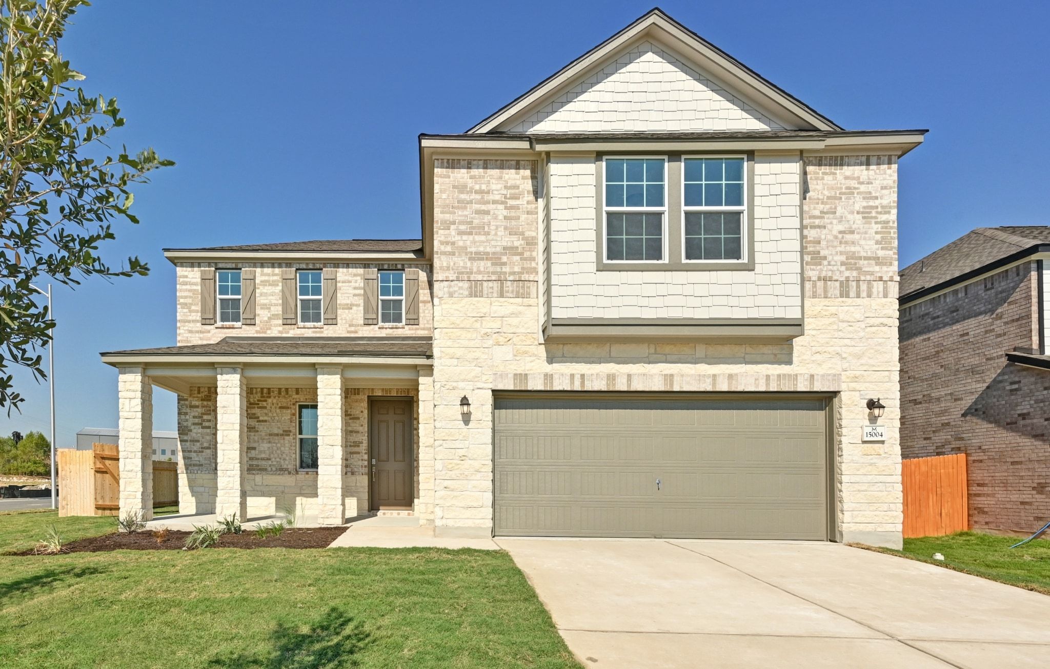 15004 Garrano Way Manor, TX 78653 - Photo 1 of 34 front view of a house with a yard