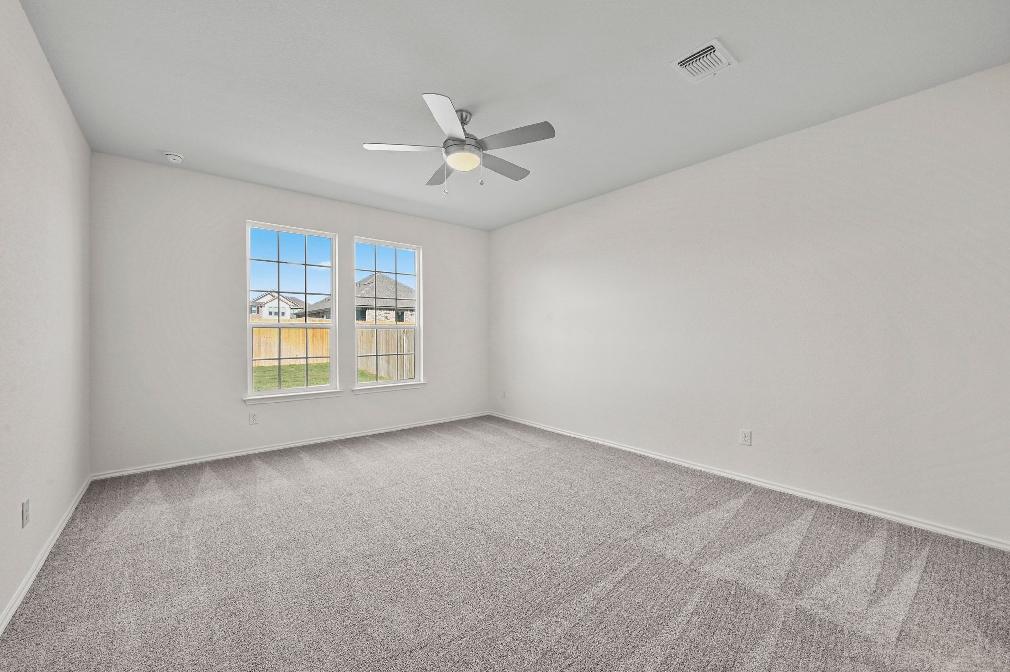 15004 Garrano Way Manor, TX 78653 - Photo 15 of 34 a view of an empty room with a window
