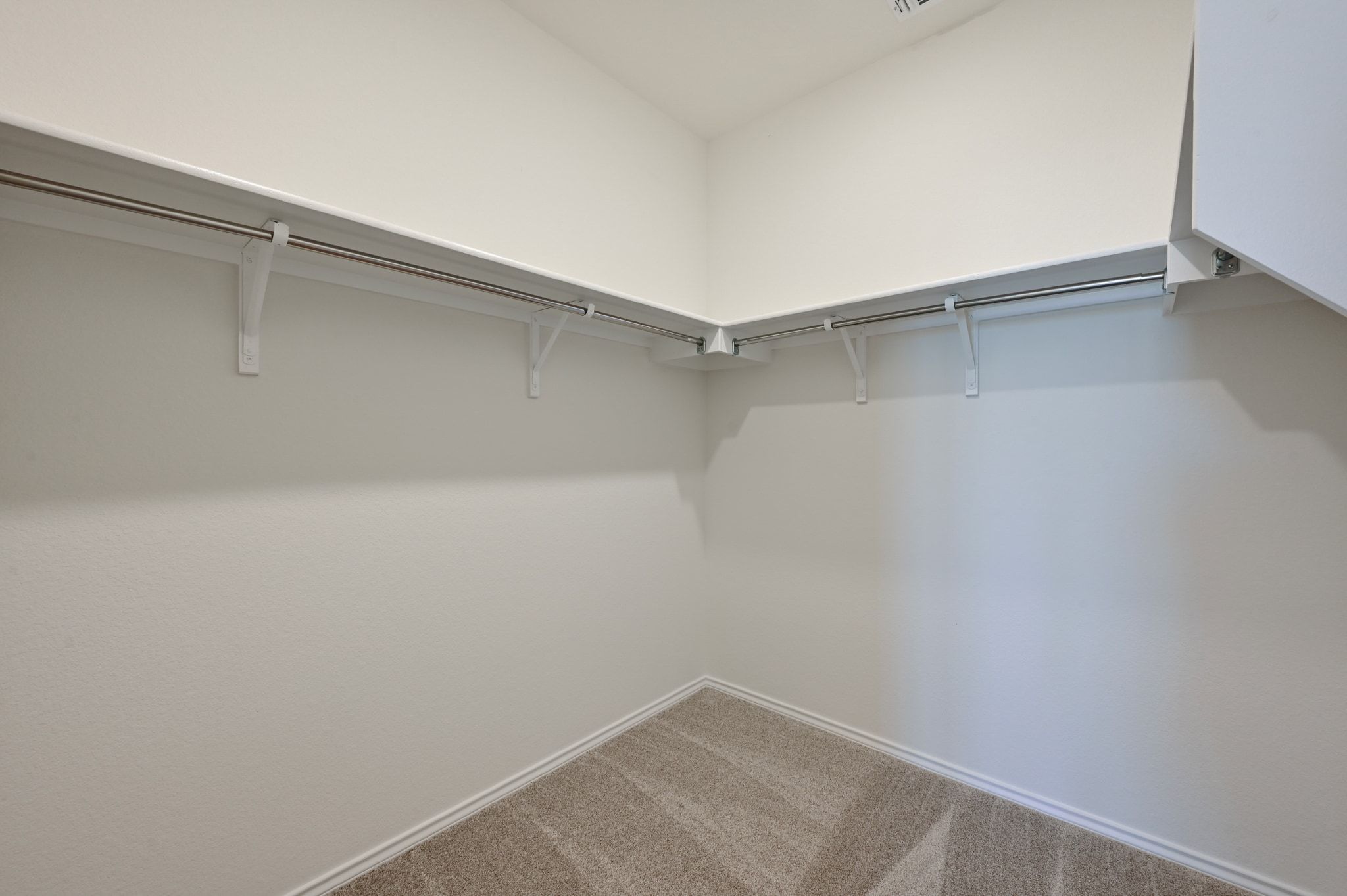 15004 Garrano Way Manor, TX 78653 - Photo 16 of 34 a view of a room with shelf on the wall