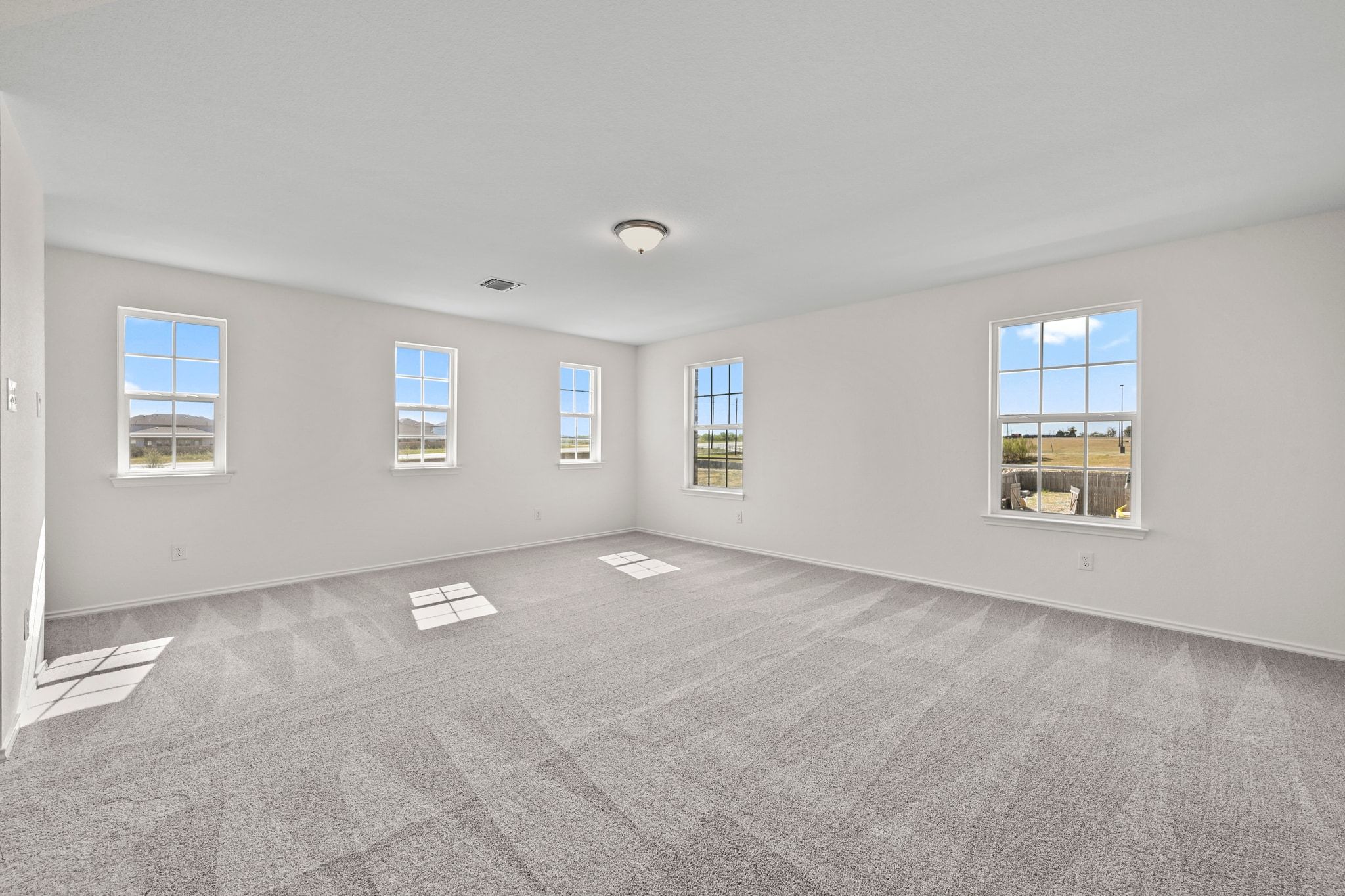 15004 Garrano Way Manor, TX 78653 - Photo 23 of 34 a view of an empty room with a window